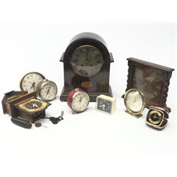 Collection of clocks - Early 20th century arched top mantel clock with inlay, oak mantel clock with quarter veneer dial and barley twist uprights, small cuckoo type clock, and six other smaller clocks (9)
