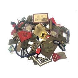  Collection of Military Formation and Division Cloth badges incl. Pioneer Corps and Royal Engineers and Signals shoulders, Chevrons, Anti-Aircraft, 1st Corps and Armoured, German Luftwaffe eagle, Slip-on titles incl. Foresters, Oxfbucks, W.Yorks, Green Howards, etc two lanyards, qty  
