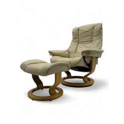 Ekornes Stressless - swivel armchair upholstered in cream leather (W81cm, H103cm); together with matching stool (W49cm)