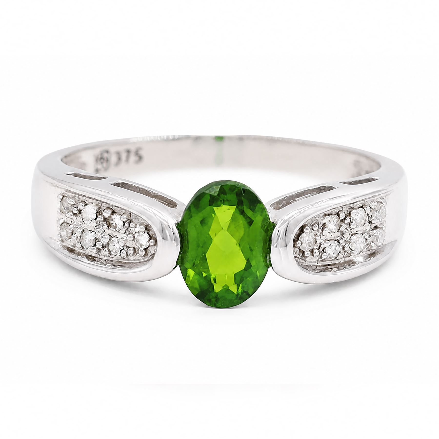 9ct white gold tsavorite garnet and diamond ring, single oval cut garnet with pave set diamond shoulders, Birmingham 2008