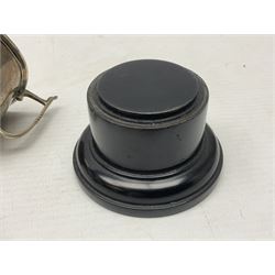 1930's silver twin handled trophy cup, upon black circular plinth, hallmarked Birmingham 1936, approximate silver weight 47 grams