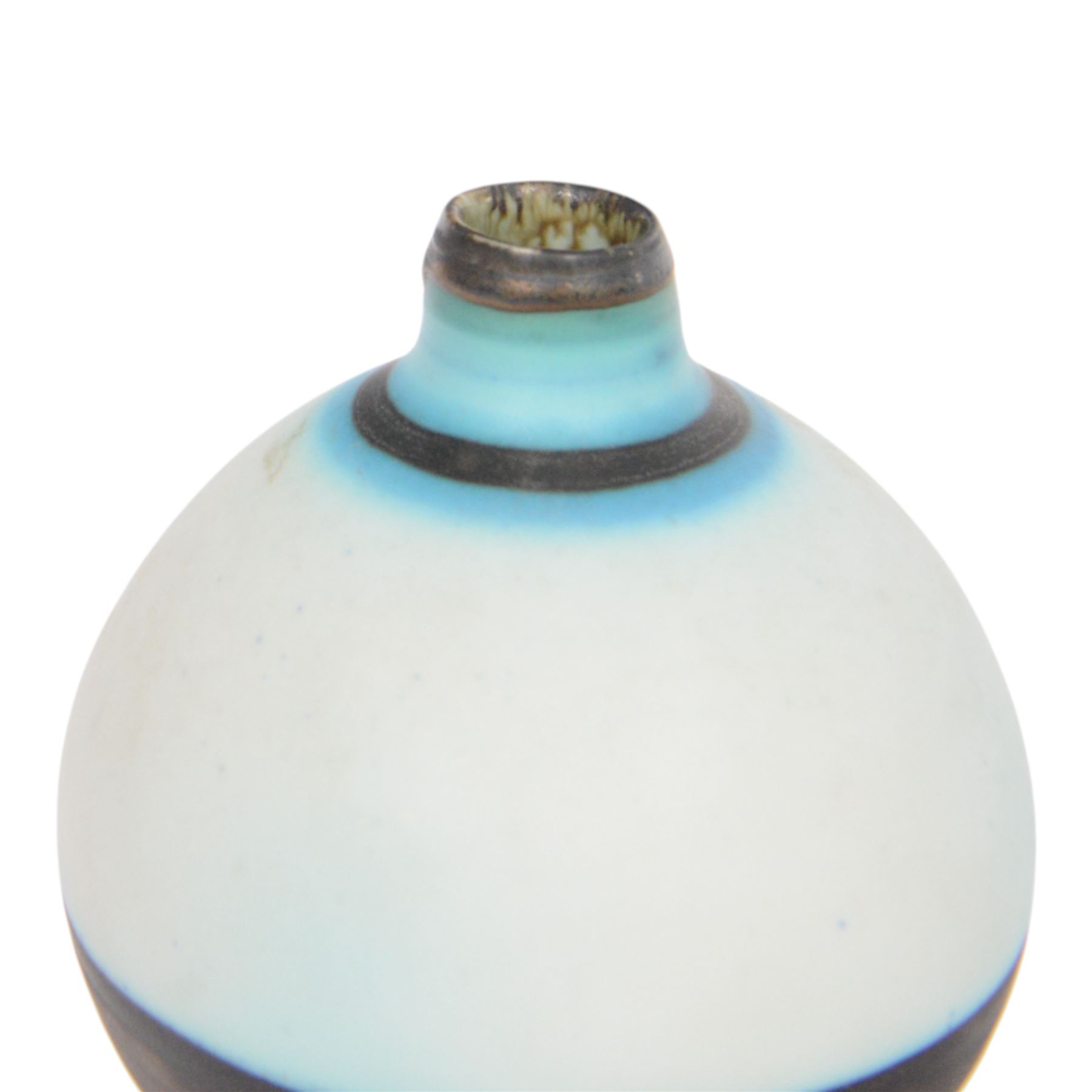 Richard Baxter; studio pottery vase in blue tones with metallic bands, H12cm  