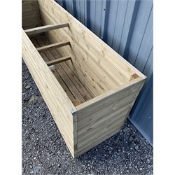 Large Ruby rectangular tanalised timber planter  - THIS LOT IS TO BE COLLECTED BY APPOINTMENT FROM DUGGLEBY STORAGE, GREAT HILL, EASTFIELD, SCARBOROUGH, YO11 3TX