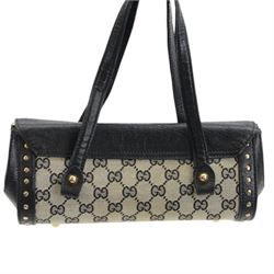 Gucci 'Bamboo Bullet' shoulder handbag, the canvas body with repetitive GG logo design and black studded leather border, with gold tone clasp impressed Gucci, and bamboo handle, with interior zip pocket, serial no. 910998 9019 impressed to interior leather, with Gucci satin dust bag, H14cm, W20cm