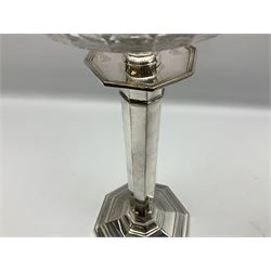 20th century Hawksworth, Eyre & Co silver plated oil lamp, the octagonal stepped base with engraved dedication, leading to an octagonal column supporting a faceted clear glass reservoir, Hinks Duplex burner, clear glass chimney, and cranberry glass shade, overall H71.5cm