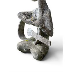 Composite stone sculptured figure playing a guitar, and a shell sculpture (2)