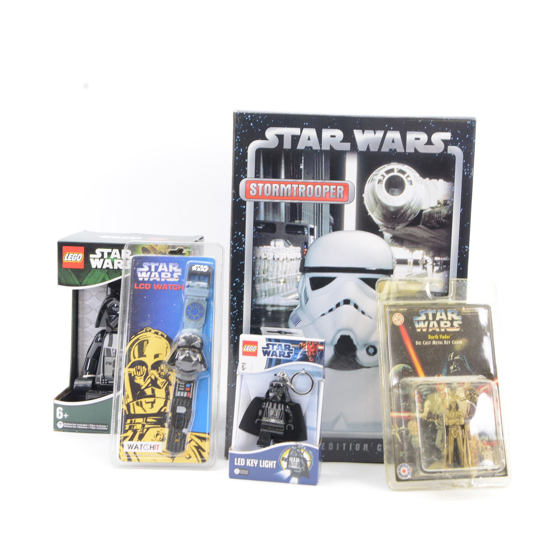 Star Wars collectables, comprising Cards Inc. Characters Star Wars Storm Trooper Collector's Edition Cookie Jar, Lego Star Wars Darth Vader Alarm Clock and Led Key Light, Placo Toys Darth Vader diecast key chain and a Watchit Darth Vader LCD watch, all boxed or carded