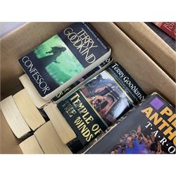 Large collection of fantasy books, to include J.R.R. Tolkien, Terry Goodwin, Christopher Paolini etc, in four boxes