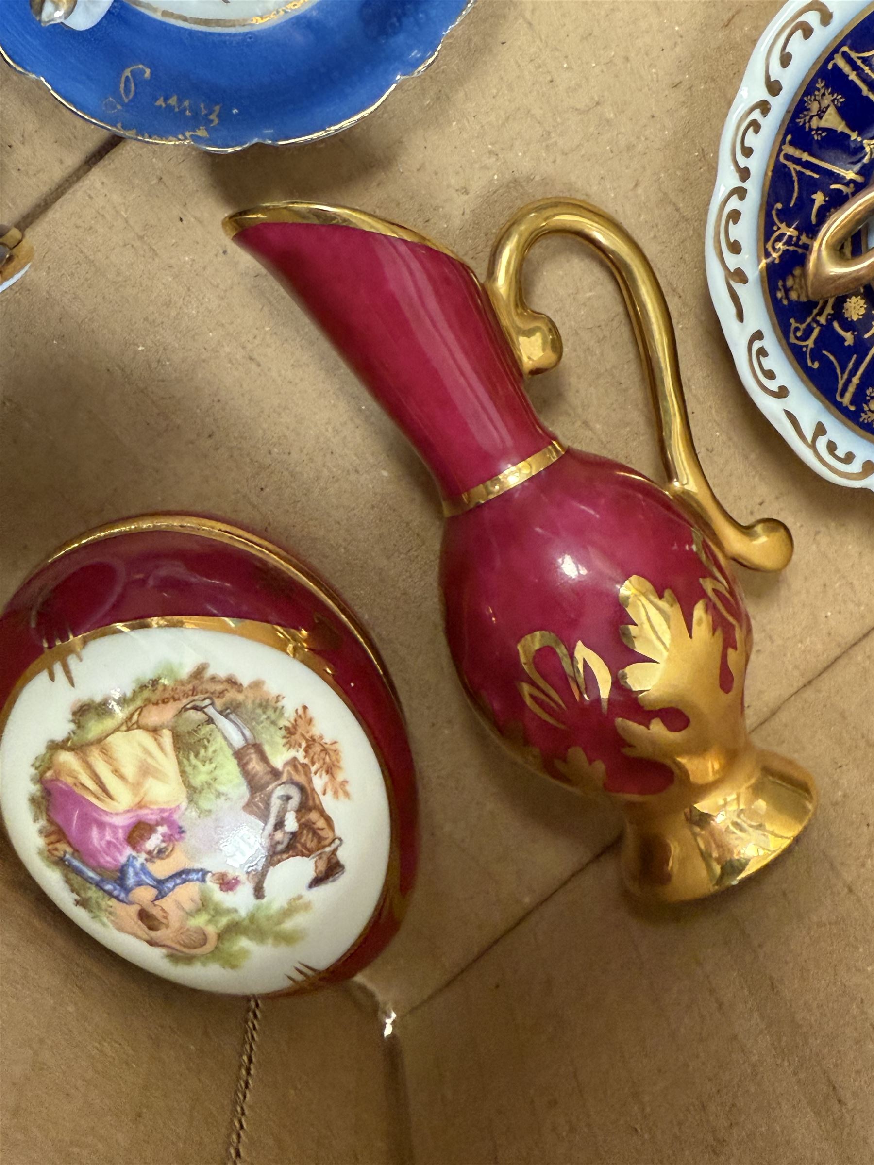 Collection of miniature Limoges and similar porcelain, including teacups and saucers, vases, comports, etc