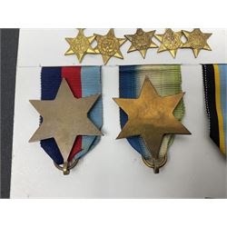 Representative display of WWII Campaign stars comprising 1939-1945 Star, Atlantic Star, Air-Crew Europe Star, Africa Star and Pacific Star; together with the corresponding group of miniatures; all with ribbons