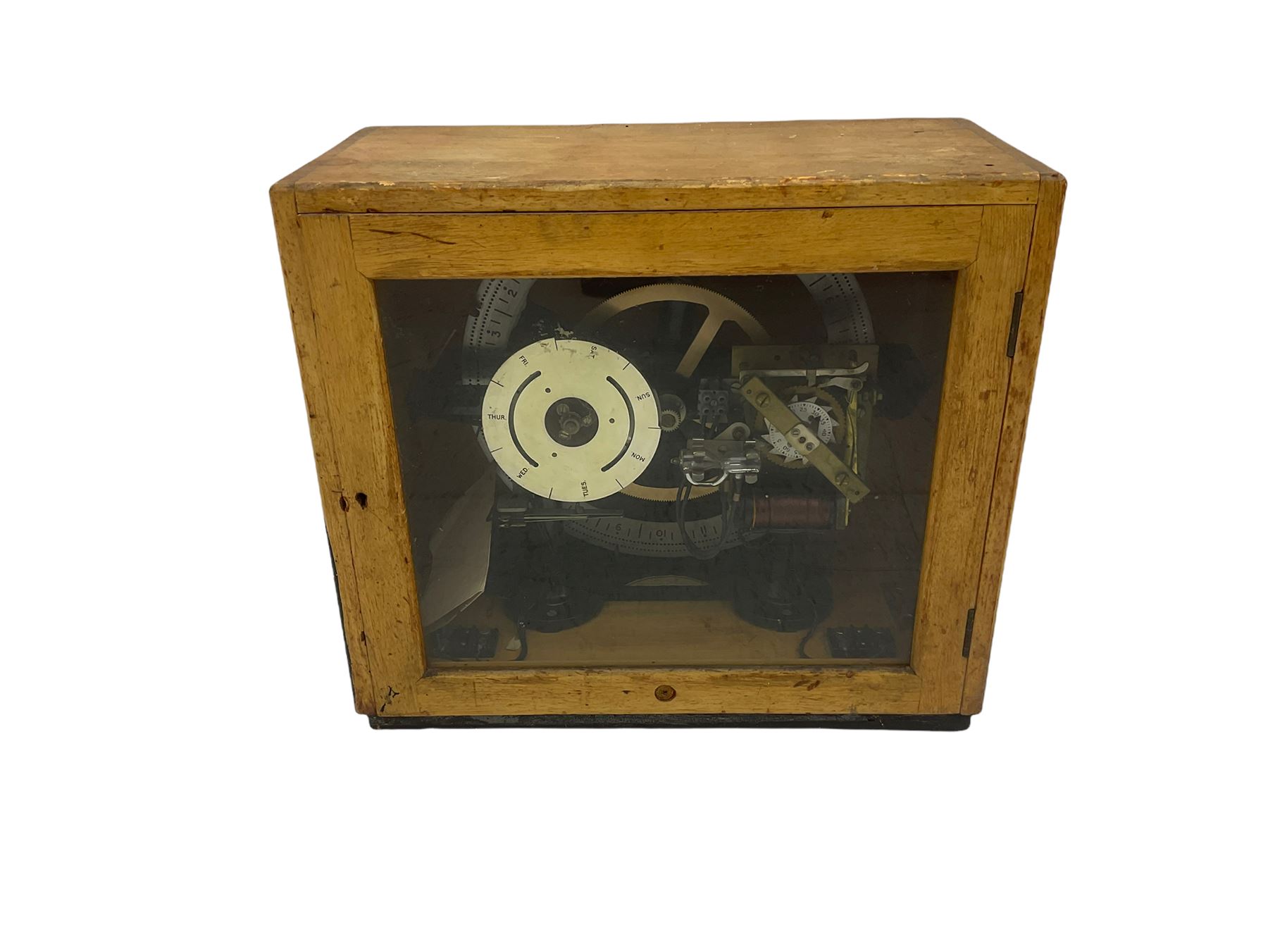 A mid-20th century Gent of Leicester(Blick Electric) Pulsynetic Master Clock in a full length glazed wooden case, with a square white dial with Arabic numerals, minute markers and baton hands, with pendulum and a record card dating from the 1970’s. 
This master clock would have been wired to send time signals to other slave dials in a large building, frequently used in hospitals, schools and factories during the 20th century
With a second electrical movement housed in a glazed square cabinet.


