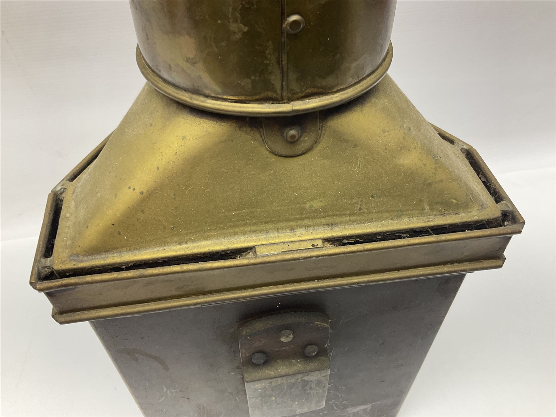 Large brass maritime lamp by Griffiths & Sons Birmingham with swing handle, threaded mounting bracket and associated oil burner, H41cm excluding handle