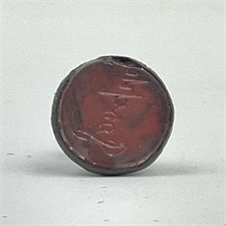 Small 19th century brass intaglio seal set with a red glass matrix engraved ‘Joseph’, H2cm