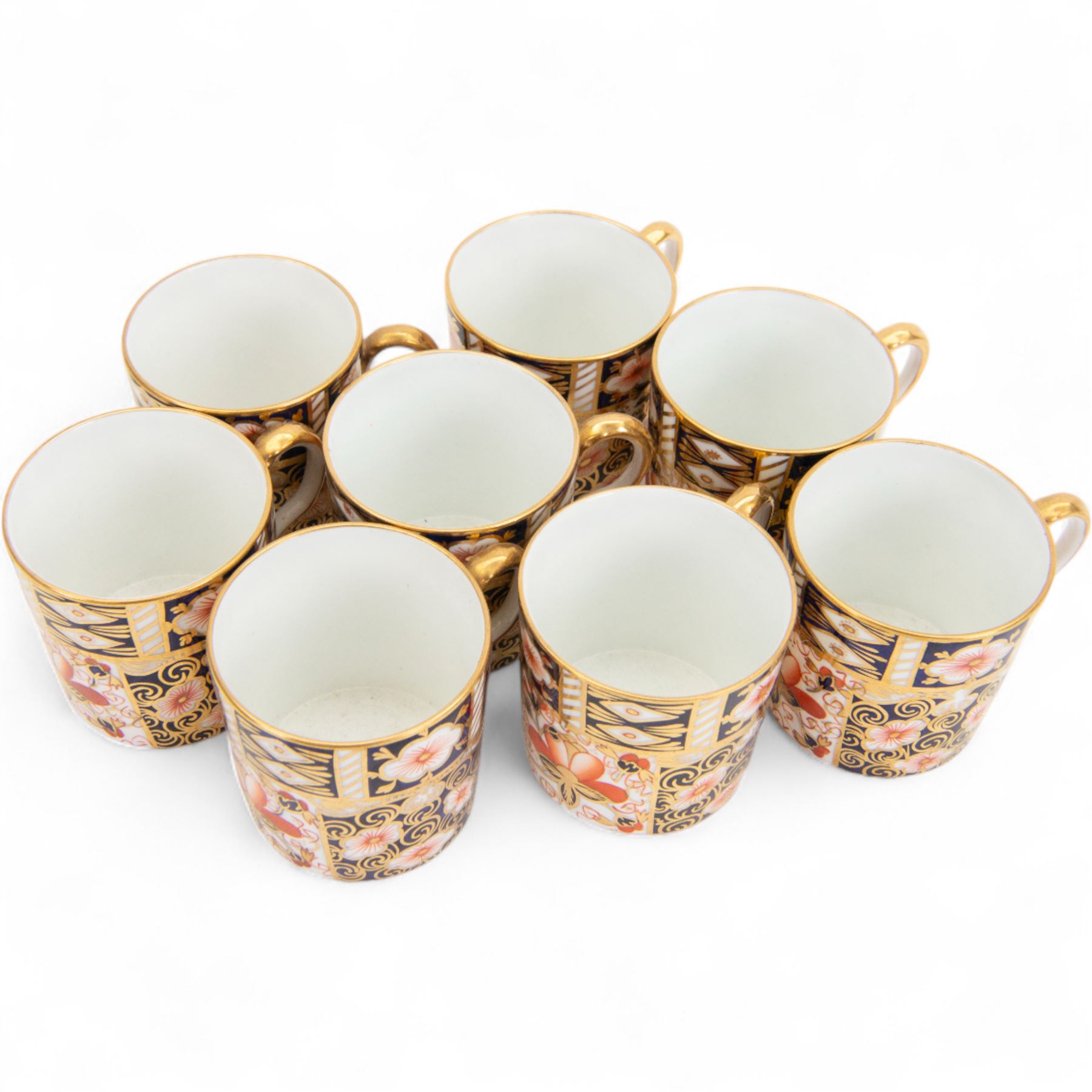 Royal Crown Derby Imari 2451 pattern, part tea service comprising eight coffee cans and saucers and seven cake plates 