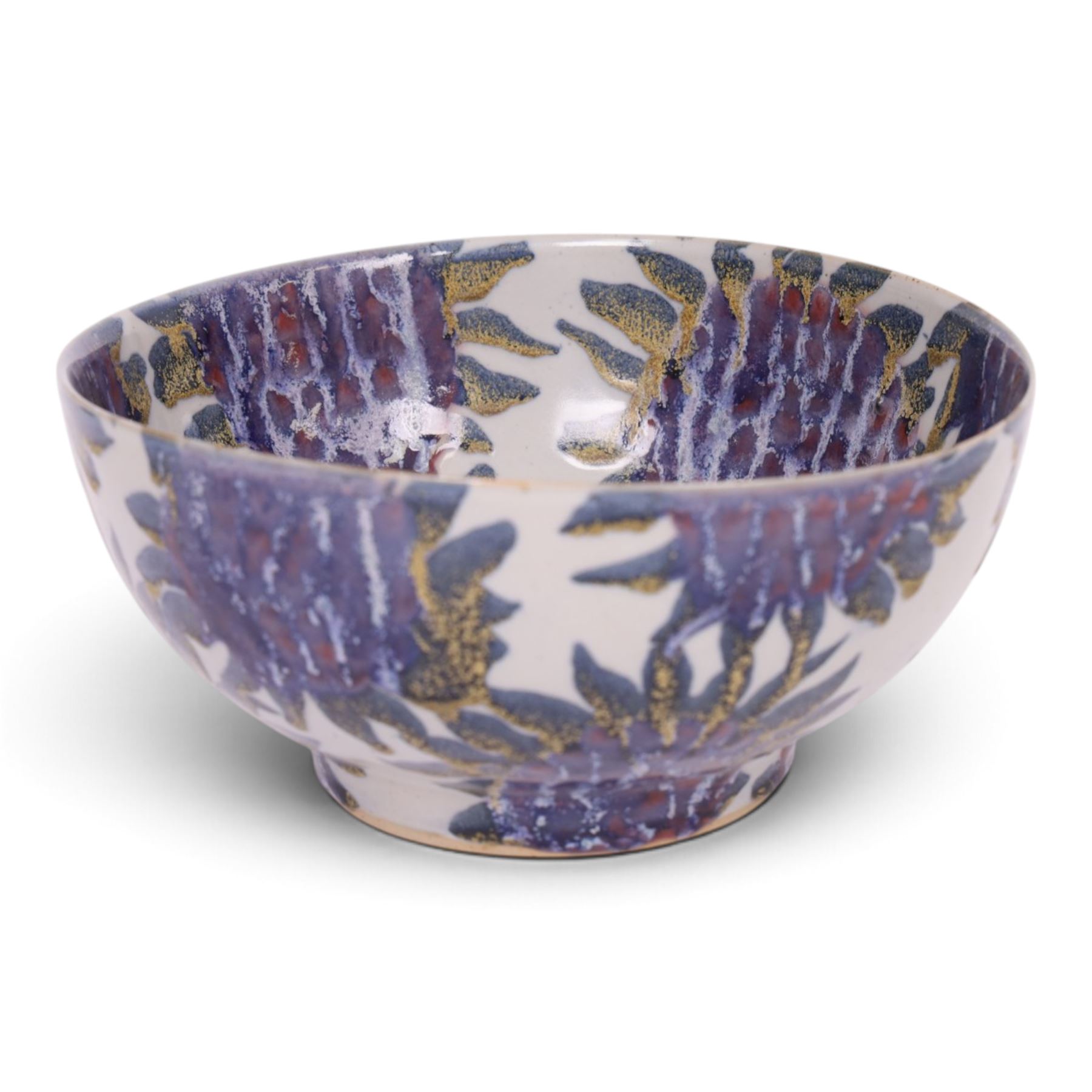 Sophie Hamilton (1963- ); Sunflower bowl, decorated with blue and purple sunflowers on a pale blue ground, with makers mark beneath, D23cm 