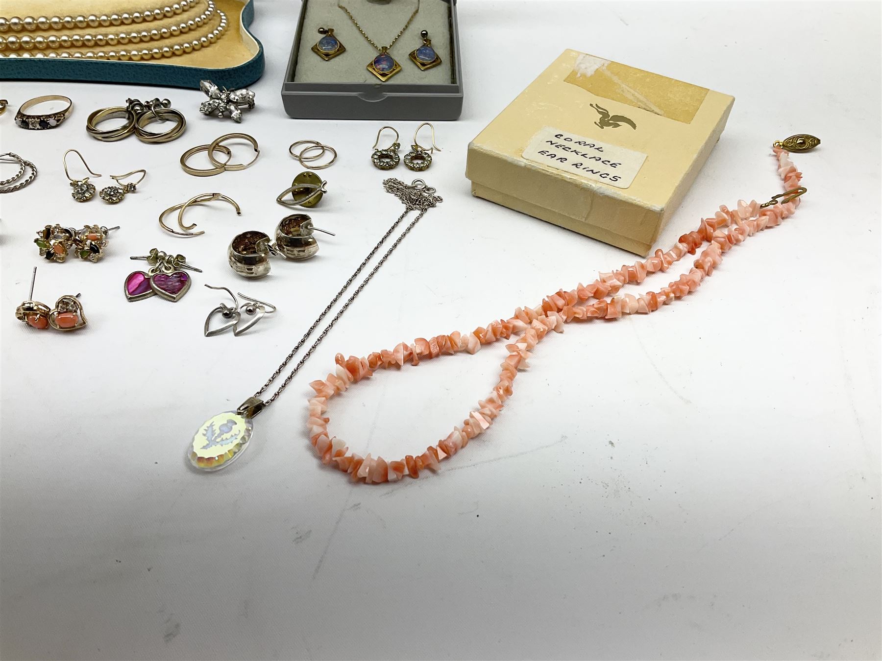 Two gold signet rings and a sapphire, opal and diamond ring, single stone diamond ring, pair of gold stone set earrings and other gold earrings, all 9ct stamped or hallmarked, silver earrings and other costume jewellery