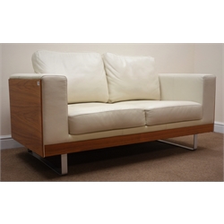  Dwell Furniture walnut framed two seat sofa upholstered in cream leather, chrome supports, W160cm  