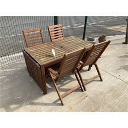 Rectangular teak drop leaf garden table, and four slatted armchairs