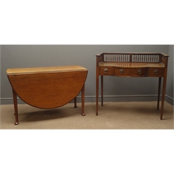  Early 20th century mahogany desk, raised gallery back, two short and one long drawer, square tapering supports, (W97cm, H89cm, D53cm) and an oval oak drop leaf table four tapering supports, (W110cm, H70cm, D147m)  