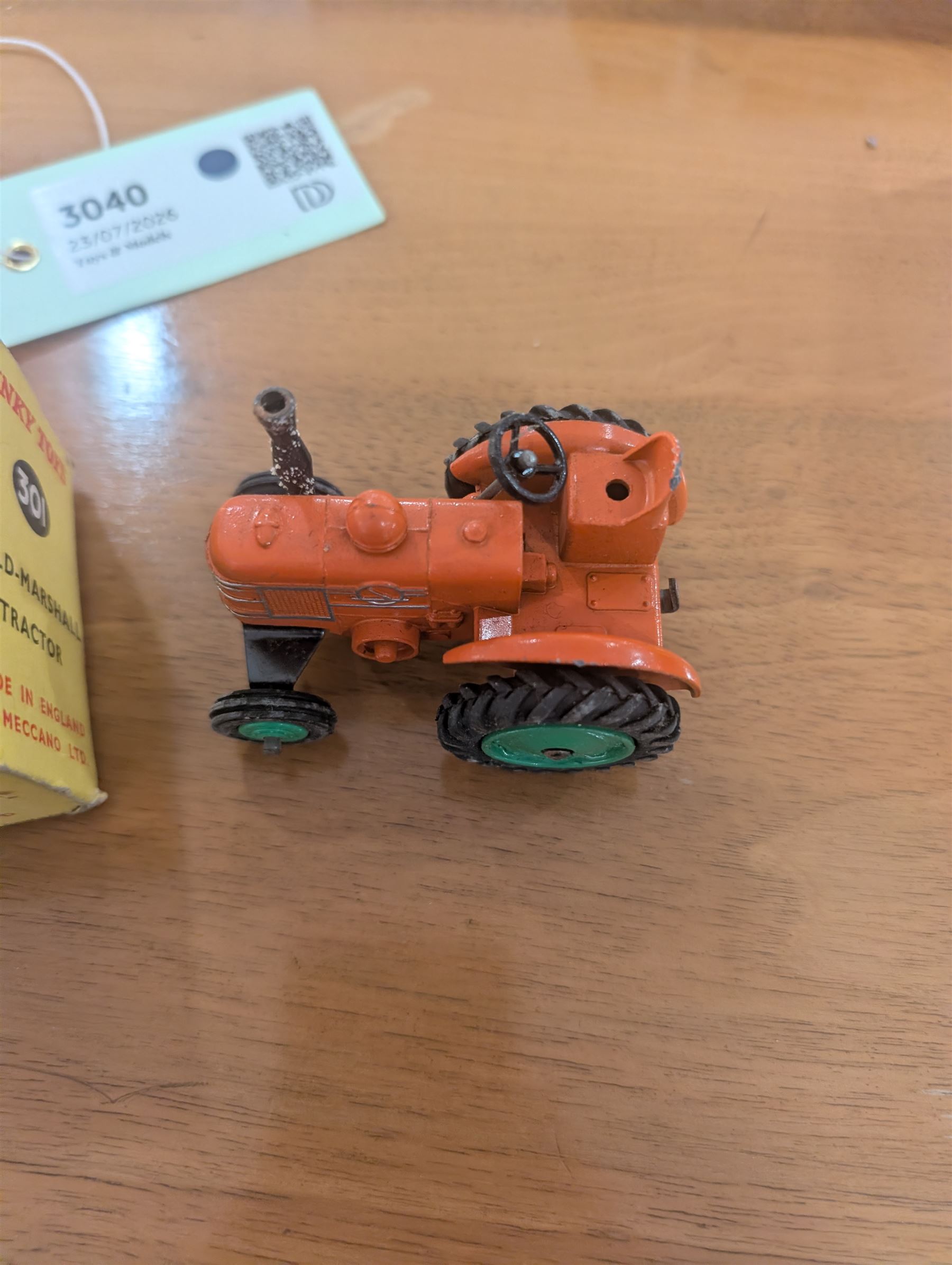 Three Dinky Toys diecast vehicles, comprising Field Marshall Tractor no. 301, Shell BP Fuel Tanker no. 944 and Snow Plough no. 958, all boxed