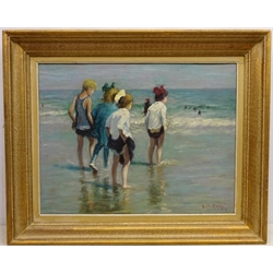  Children Paddling on the Shoreline, 20th century oil on board indistinctly signed and dated 49cm x 64cm  