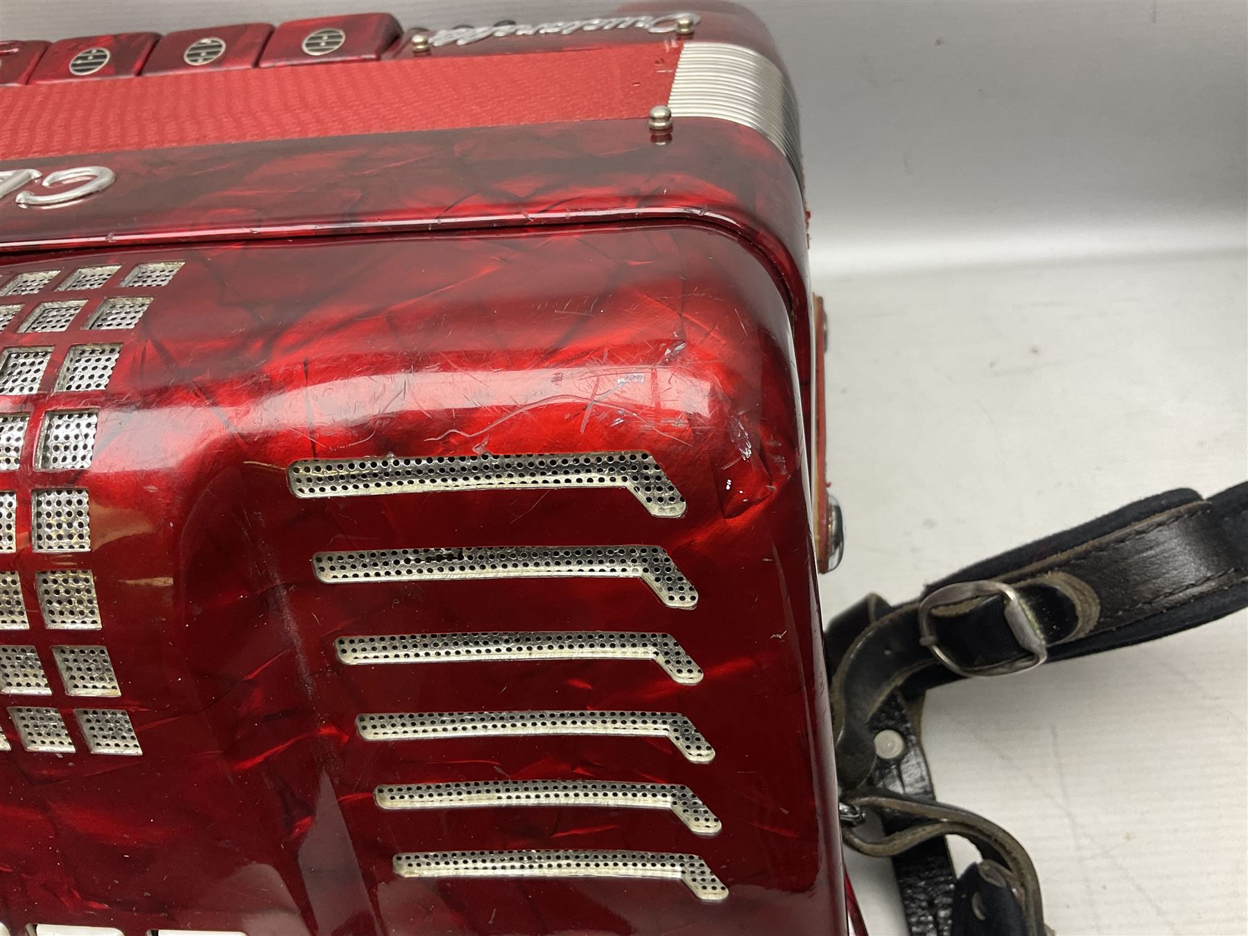 Clinkscale Crucianelli piano accordion in red pearline case with one-hundred and twenty buttons and forty-one keys L52cm; in carrying case
