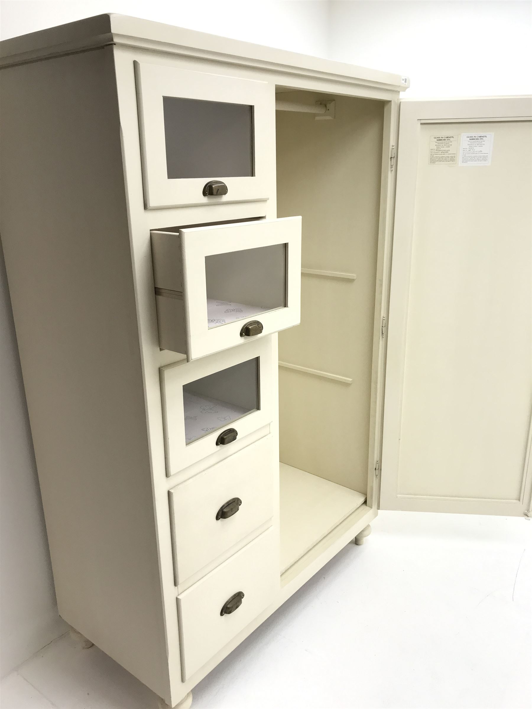 Painted combination chest wardrobe, four drawers alongside single door with full length mirror enclosing hanging rail and two shelves, turned supports