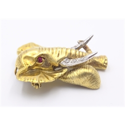  Gold elephant brooch/pendant, diamond set tusks and ruby eyes stamped 14ct  