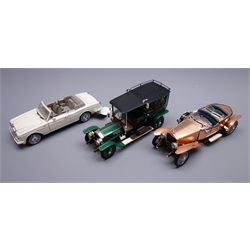  Franklin Mint - three large scale die-cast models of Rolls Royce cars comprising 1921 Silver Ghost and 1992 Corniche IV, both in polystyrene box with certificate and delivery box, and 1907 Silver Ghost in both boxes  