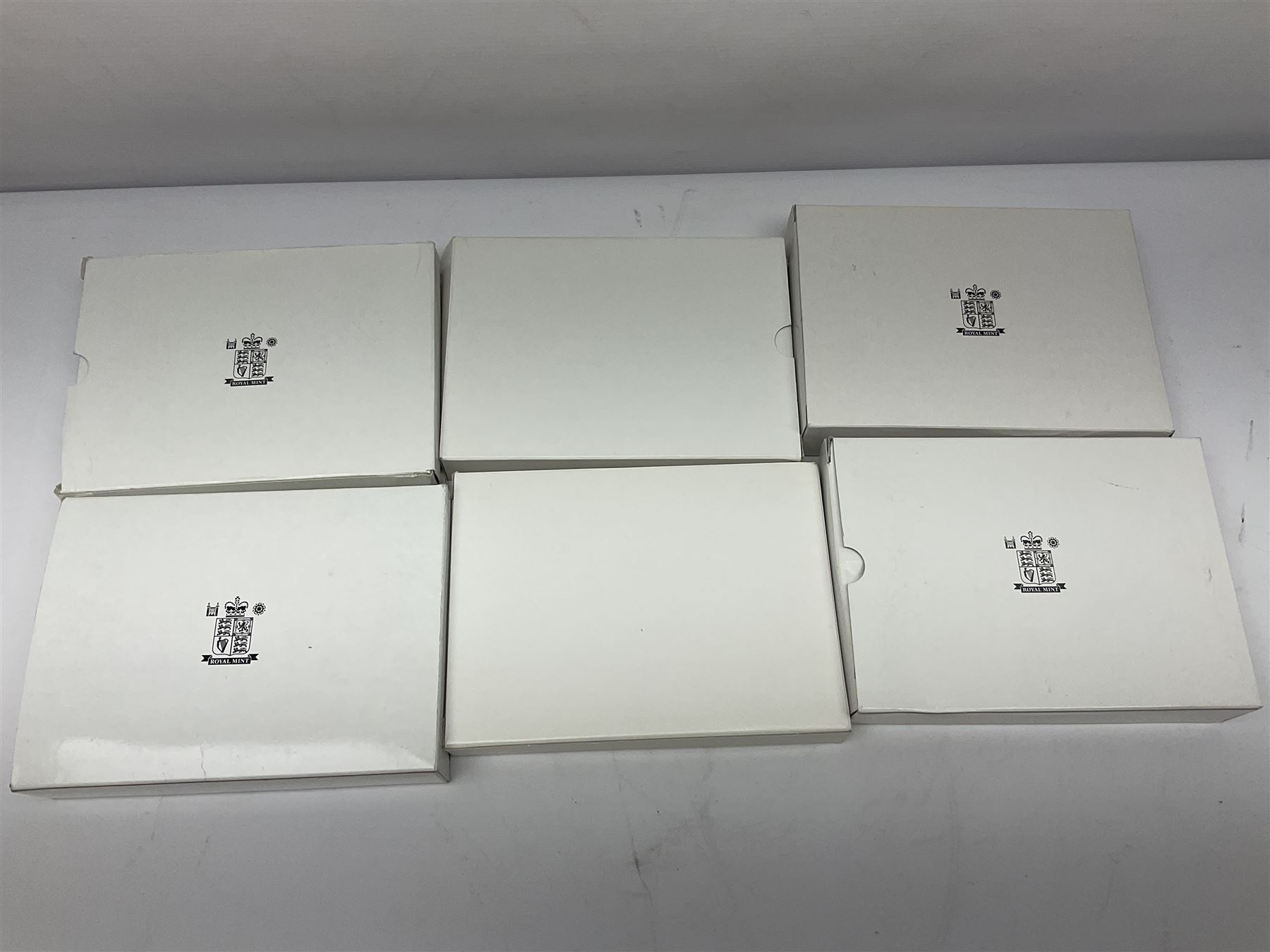 Six The Royal Mint United Kingdom proof coin collections, dated 1995, 1996, 1998, 2002, 2006 and 2007 all cased with certificates