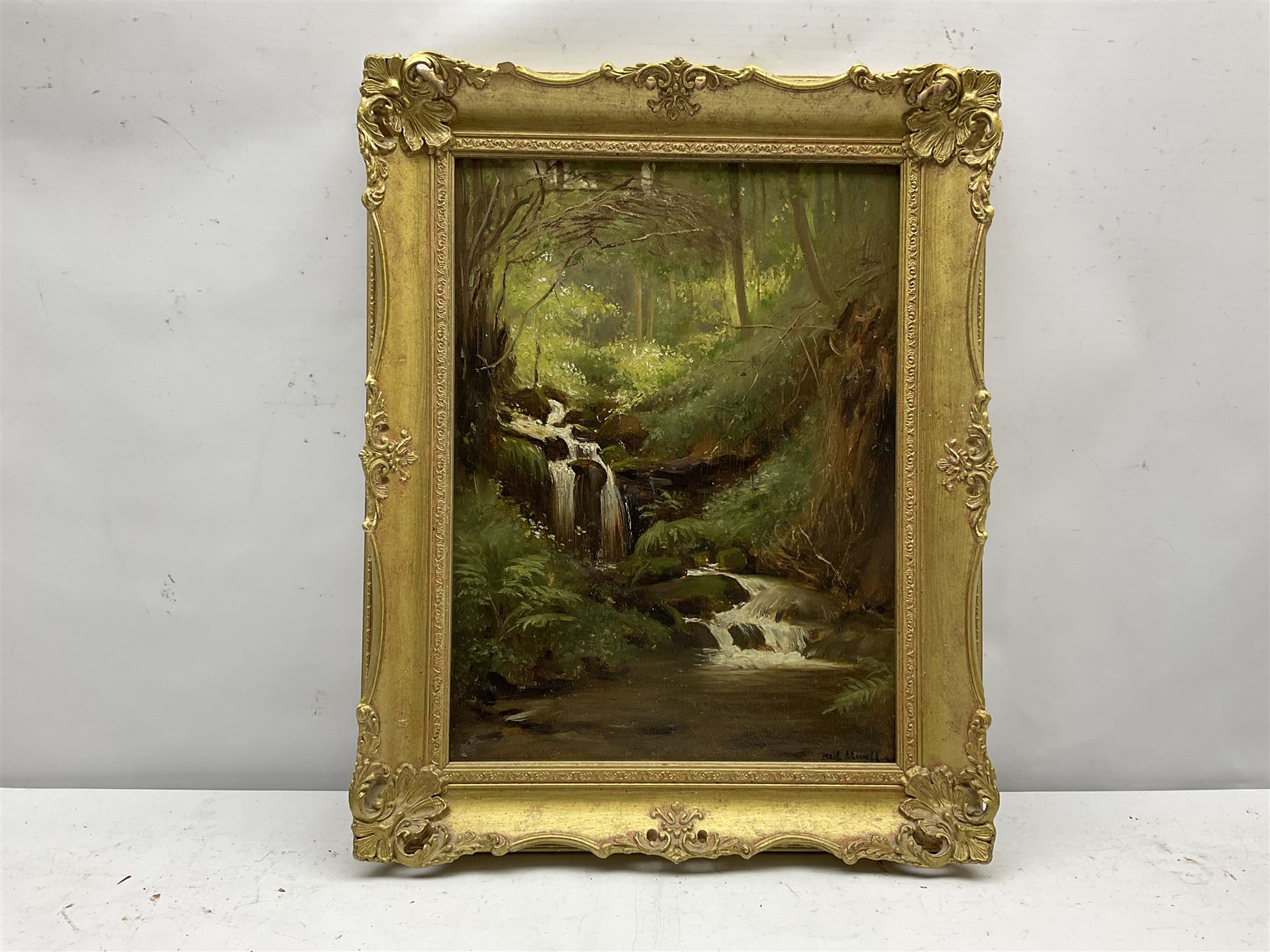 Frederick William Elwell (British 1870-1958): Woodland Waterfall, oil on panel signed and dated 1915, 39cm x 29cm
Provenance: East Yorkshire private collection

