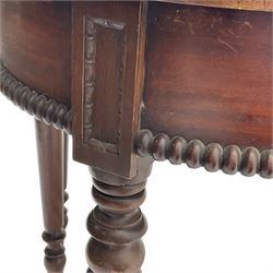 Early 19th century mahogany dining table, two D-ends with applied bead mouldings, on turned supports, with three additional leaves 