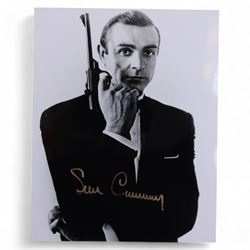 Collection of James Bond related signed film stills and promotional photographs, including Sean Connery and Pierce Brosnan promotional shots, Desmond Llewelyn, Octopussy poster, John Glenn, Blanche Ravalel, Geoffrey Holder and Julian Glover, all with certificates of authenticity