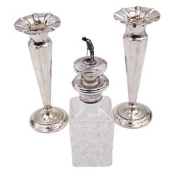 Modern silver mounted cut glass bottle, the stopper with silver finial modelled as a golfer, hallmarked A J Poole, Birmingham 1996, H17.5cm, together with a pair of Edwardian silver trumpet vases, of faceted form with fluted rims, upon weighted circular foot, hallmarked Walker & Hall, Chester 1906, H17cm