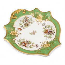 Large early 19th century Derby porcelain dessert basket, of rectangular twin-handled form, with cobalt blue and gilt decoration, painted marks beneath, L29cm together with a 19th century porcelain dessert service, decorated with floral sprays within a green and gilt border, comprising eight plates and three serving dishes, pattern no. 701/1