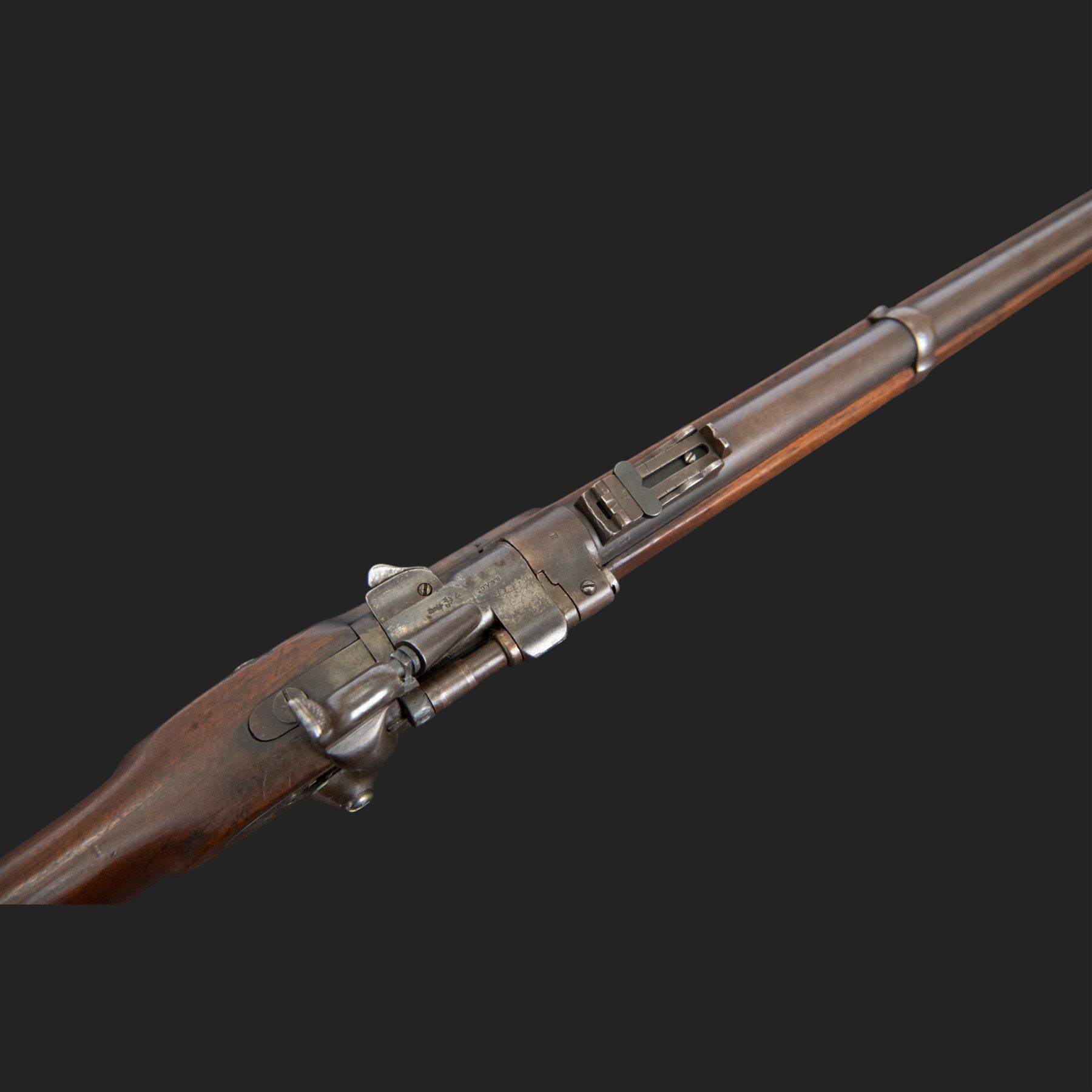 Snider-Enfield service rifle .577 calibre, barrel 33 in., tangent/ladder back sight, action marked with crowned V.R BSA & Co 1872, full stocked with two barrel bands, steel clearing rod, walnut stock marked Mx1 93 Birmingham, overall L124cm