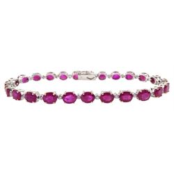 18ct white gold oval ruby and round brilliant cut diamond line bracelet, stamped 750, total ruby weight approx 13.20 carat