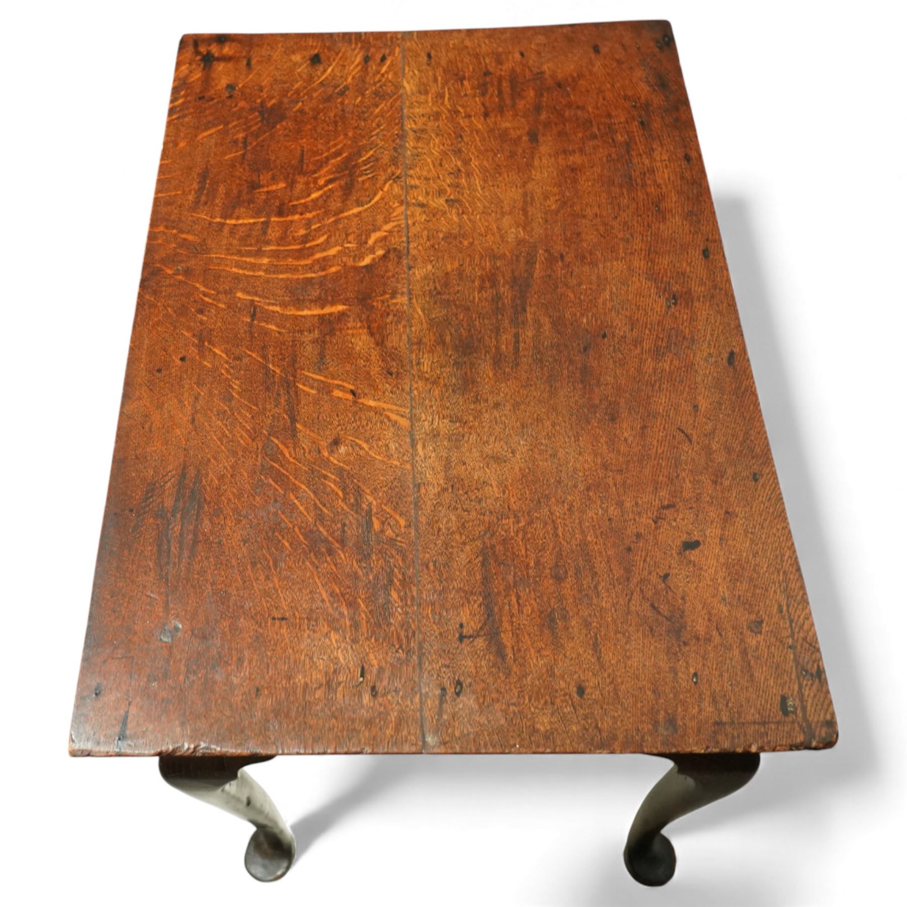 Early 18th century Georgian oak single drawer side table, the rectangular top over a single frieze drawer with pierced brass escutcheon and handles, shaped apron, raised on cabriole legs with pad feet