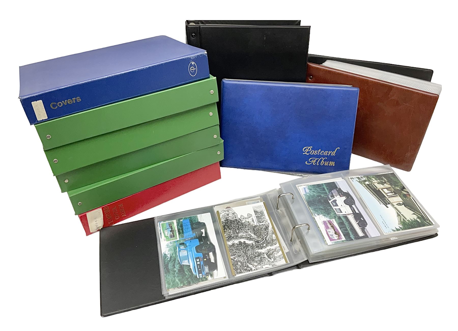 Mostly Chinese stamps including  covers and postcards, many being from the 80s and 90s, housed in ten folders