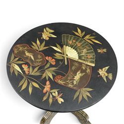 Late Victorian Aesthetic Movement ebonised and parcel-gilt lacquered occasional table, the circular tilt-top decorated in the Anglo-Japanese taste with motifs of fans, birds, insects and flowering branches, raised on a turned pedestal and tripod base shaped splayed supports