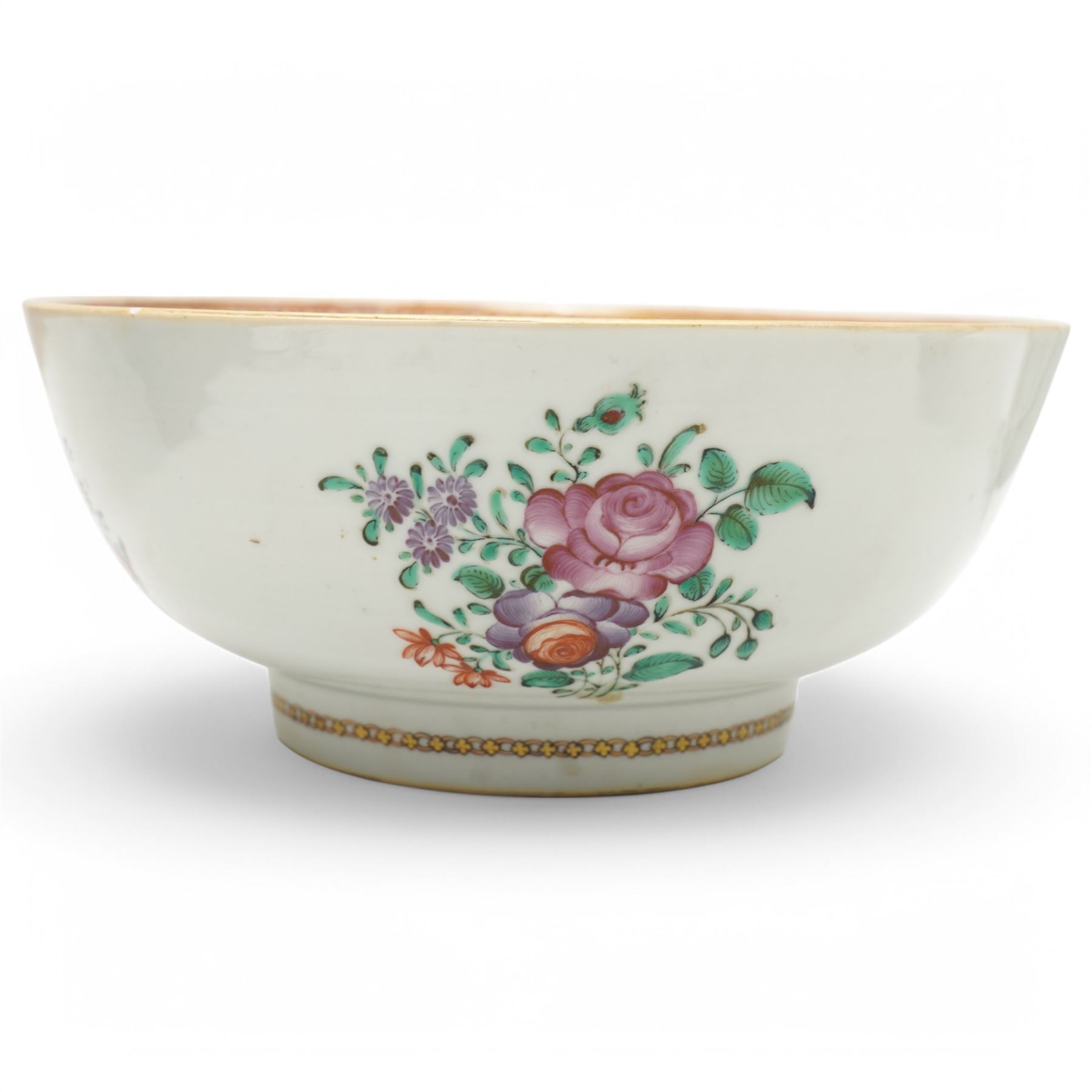 Chinese export Armorial part service decorated with sprays of flowers and a crest of an arm holding an anchor comprising bowl D23cm, pair of octagonal plates 16cm and sparrow beak jug H12cm (4)