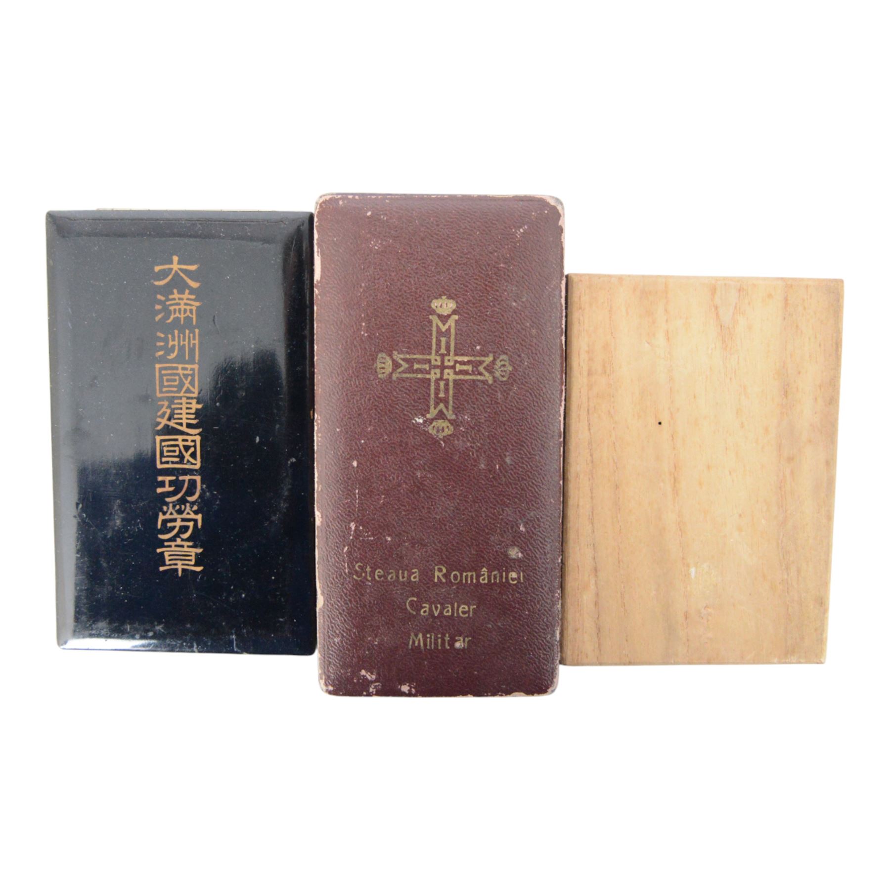 Collection of fifteen worldwide award/medal empty boxes and cases, including examples from USA, Germany, Japan, Greece, Belgium, N.Korean etc
