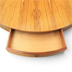 Robert Heritage for Archie Shine - mid-20th century santos rosewood drum table, circular top with four drawers with recessed handles, receded elements, raised on a cylindrical support with three legs