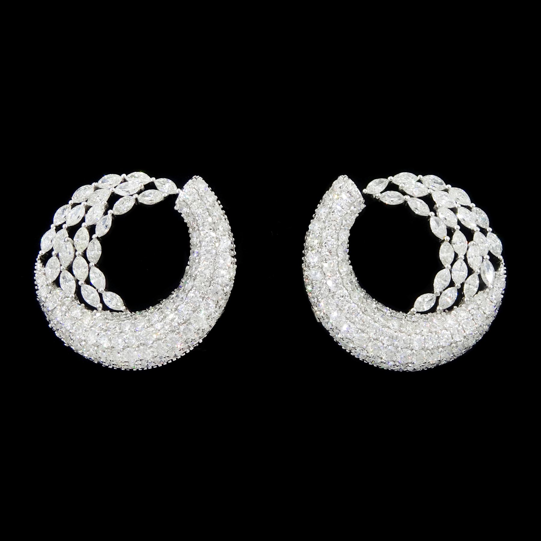 Pair of 18ct white gold marquise cut and pave set, round brilliant cut diamond crescent stud earrings, stamped, total diamond weight approx 9.30 carat