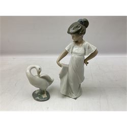 Quantity of figures to include Lladro example modelled as swan together with three Nao figures to include two April Showers no 1126, two with boxes 