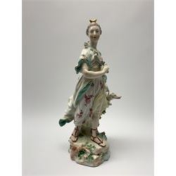 Mid 18th century Derby porcelain figure modelled as Dianna the Huntress, with quiver of arrows upon her back and dog by her side, upon a naturalistically modelled base, with patch marks beneath and collectors labels, H26cm