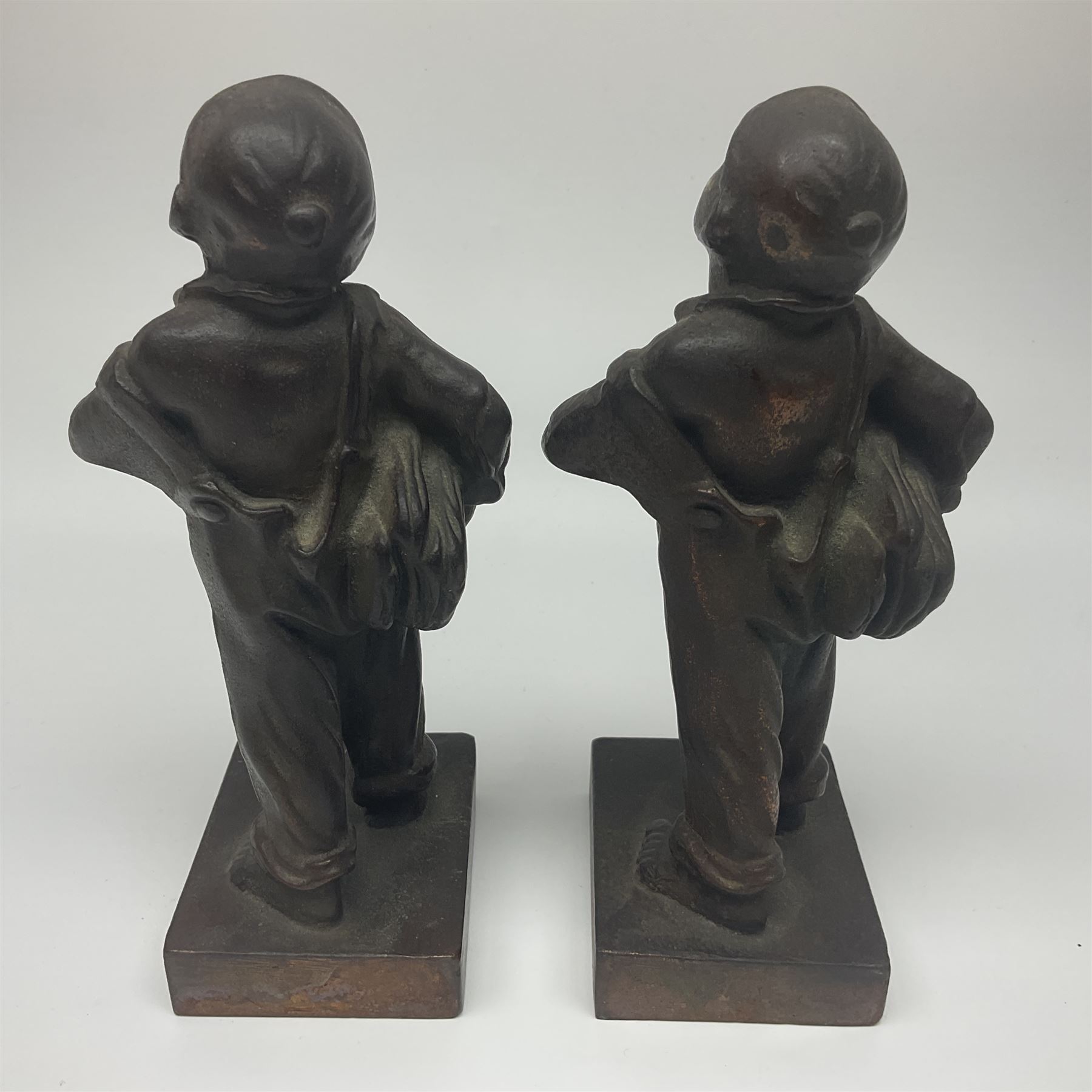 Pair of cast iron Qualcast advertising figures of news boys marked 'Speshul',  H18cm