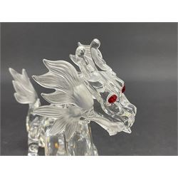 Two Swarovski Crystal Signs of the Zodiac figures, comprising horse and tiger, together with Zodiac dragon holding the flaming pearl, largest H11cm 