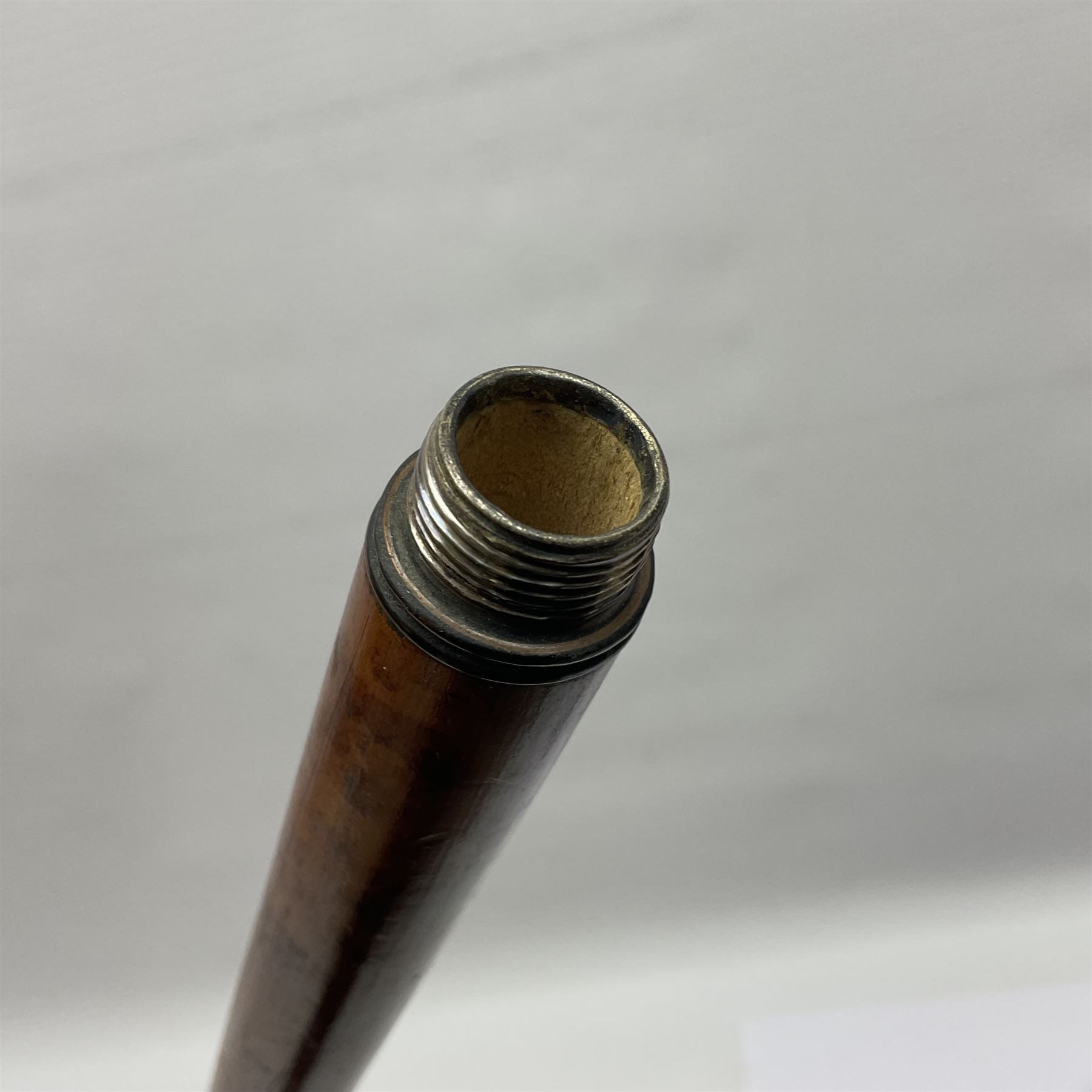 19th century malacca walking cane, the screw threaded domed cover opening to reveal vacant recess, above a further screw threaded opening revealing a removable glass vial with stopper, glass vial L41cm, cane L89.5cm