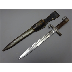  Austrian Bayonet, 25cm single edge fullered steel blade stamped CE over WG with hooked quillion, wooden slab grip stamped 7, with hanging loop, L36cm, in steel scabbard with leather Frog  
